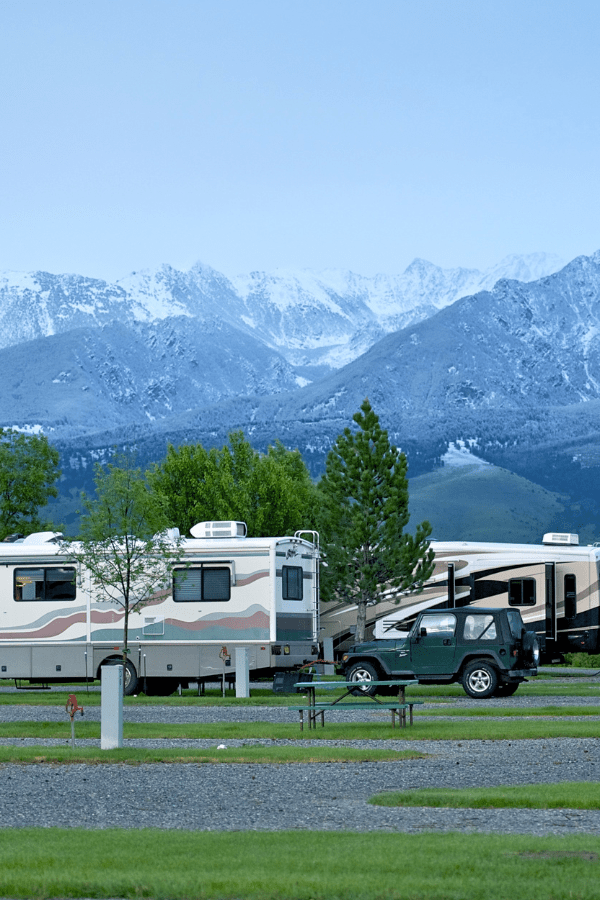 RV parked with mountain view in background